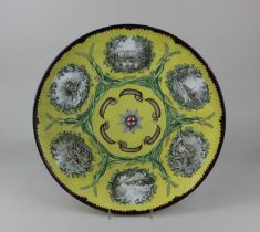 A Victorian hand-painted wall charger verso inscribed 'The Beaconsfield Plate designed and painted