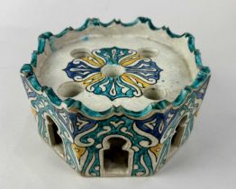 An antique Moroccan pottery inkwell being of Moorish octagonal architectural form, having five ink