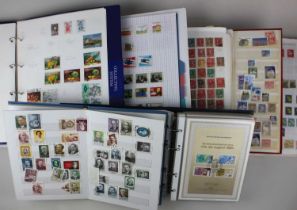 Seven albums of World stamps to include two albums of 19th century and later Canada stamps, an album