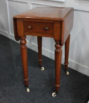 A Victorian mahogany small Pembroke style side table with two drop side flaps, on turned legs and