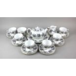 A Wedgwood porcelain 'Ashford' pattern part tea service decorated with figs comprising platter,