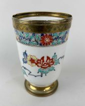 An antique French gilt-metal mounted porcelain tobacco or snuff jar in the Chantilly Kakiemon