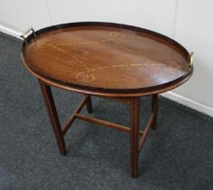 An Edwardian mahogany inlaid oval tray on stand 67cm