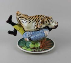 A Roger Michell Tippoo's Tiger character sauce jug and dish produced as a limited edition for Lustre