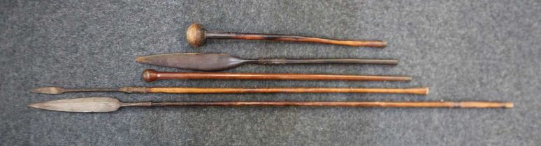An African knobkerry two metal bladed spears, short wooden spear and another wooden club, largest