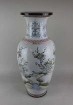 A large Chinese porcelain vase baluster form decorated with flowers and birds on a white ground,