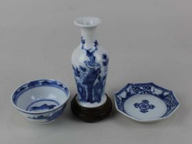 Three pieces of Chinese blue and white porcelain comprising a miniature vase painted underglaze with