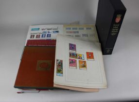 Two albums of British and World stamps (part full) to include the British Post Office Royal Mail