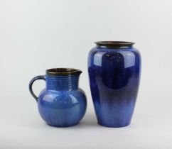 A Denby pottery blue glazed vase and jug tallest 25cm high