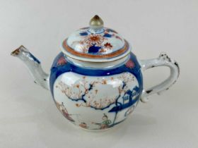 An 18th century Chinese porcelain teapot and cover decorated in the Imari palette with overglaze