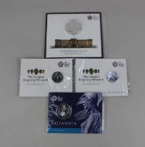 A Royal Mint Buckingham Palace 2015 UK £100 commemorative silver coin a Britannia 2015 UK £50 coin