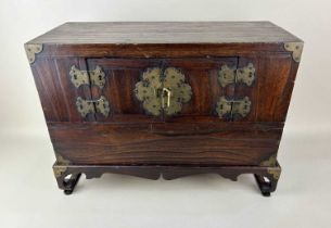 A Korean table top chest on stand (bandaji) early 20th century. Being of stained pine and applied