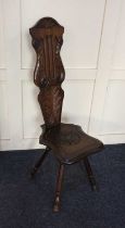 A carved oak spinning chair, possibly Welsh