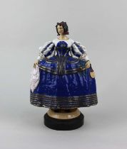 A Harry Parr pottery figure modelled as a female in Elizabethan style costume inscribed 'Hy Parr