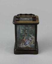 An early 20th century French brass carriage clock, with enamelled panels depicting printed