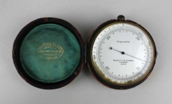 A Negretti and Zambra London 20130 hand held compensated barometer in original leather case 7cm