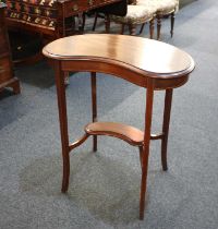 An Edwardian mahogany kidney shaped side table with under tier, on slender supports 65cm