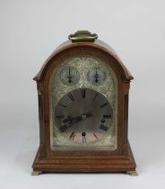 A Winterhalder & Hofmeier oak cased bracket clock, the silvered dial inscribed with Roman