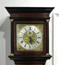 An 18th century walnut longcase clock, the striking movement with 11 inch square dial with gilt