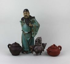 Two Chinese pottery teapots, each with impressed seal mark to base, together with a Chinese