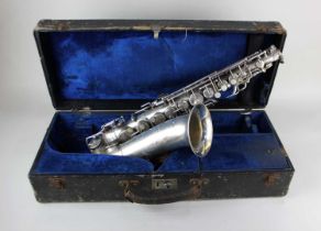 A saxophone by E J Albert, Bruxelles, in fitted case (a/f)