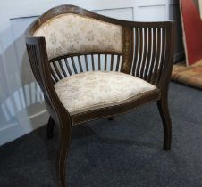 A Victorian inlaid slatted tub chair with upholstered back panel and seat