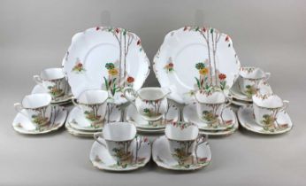 An Art Deco Standard China part tea set pattern 771235, Tudor shape, comprising milk jug, two