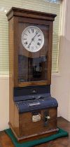 An International Time Recording Company oak cased clocking in wall clock 100cm high