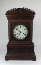 An early 19th century John Baptiste Beha fret cut cuckoo clock with double fusee movement striking