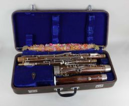 A bassoon in fitted case (a/f)