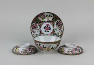 A Chinese famille rose porcelain bowl and cover on stand, character marks to base, with extra