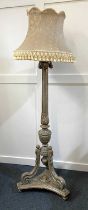 An ornate vintage period style silvered carved wood standard lamp the acanthus carved, turned and