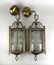 A pair of brass mounted ceiling lantern light fittings with glazed panel sides 52cm high overall