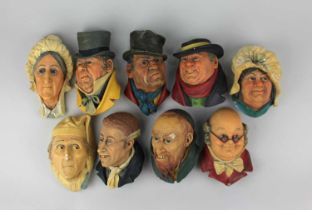 A collection of nine Bossuns heads depicting Charles Dickens characters to include Fagin and Uriah