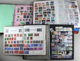 Eight albums and folders of British and International stamps (part full) to include The Stanley