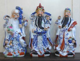 Three large Chinese figures of The Immortals tallest 65cm high