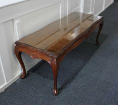 A walnut rectangular shaped coffee table carved border with glass covered top on cabriole legs,