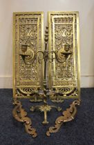 A pair of 19th century Belgian gilt metal grilles originally from a fireplace, marked 'Bruxelles