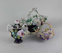 A 19th century Coalbrookdale porcelain basket encrusted with flowers, marked 1678 to base 18cm high,