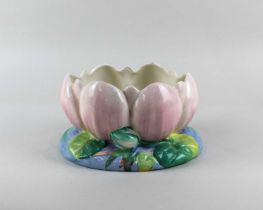 A Clarice Cliff pottery bowl modelled as a pink water lily bowl 19cm diameter