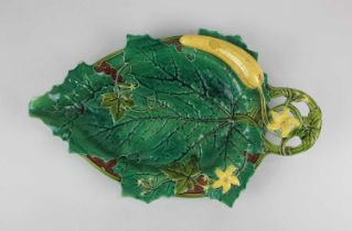 A Minton majolica platter c1870, with large flowering green leaf and yellow cucumber, pattern number