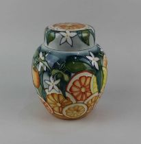 A Moorcroft pottery 'Florida' pattern ginger jar and cover decorated with oranges and lemons amongst