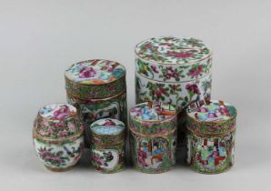 Six Chinese Cantonese famille rose porcelain pots and covers decorated with figures, birds and