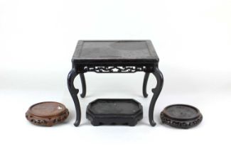 A collection of four various Chinese hardwood stands