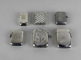 Six various silver vesta cases including one with diagonal fluting, 4.3oz