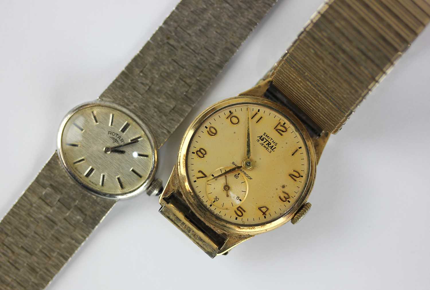 A Smiths Astral 9ct gold circular cased wristwatch, the signed dial with Arabic numerals and
