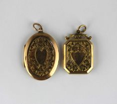 A gold back and front cut cornered rectangular pendant locket with floral and foliate engraved