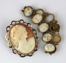 A 9ct gold framed carved cameo brooch, 5cm by 4cm, and a yellow metal framed carved cameo
