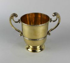 A George III silver gilt loving cup, maker possibly I.D, London 1774, 16cm high, 19.2oz