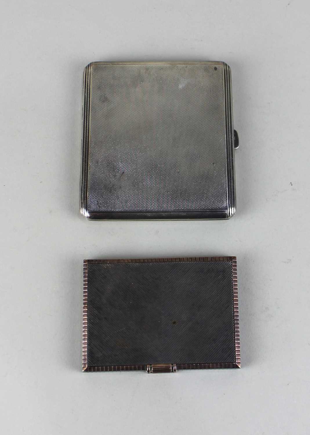 A George VI silver rectangular snuff box with engine turned decoration and gilt interior,